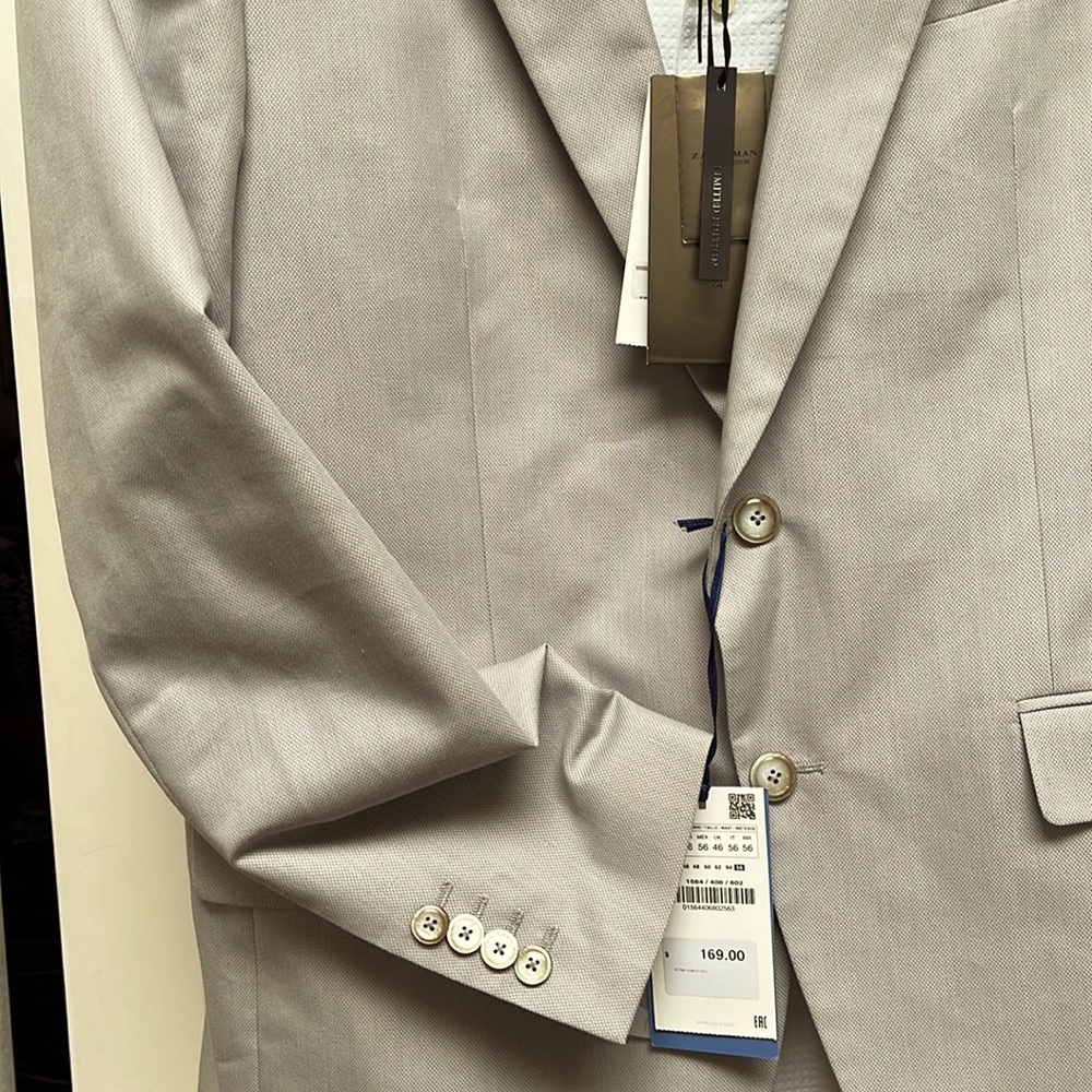 Jacket never worn. Handsome grey with handkerchief. Cute. Zara made. Size on tag